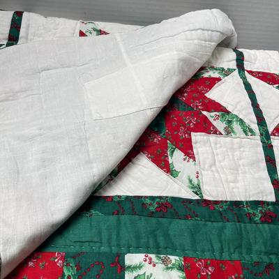 Sale Photo Thumbnail #653: 50×60 in, red/green/white patchwork with central star and festive prints.