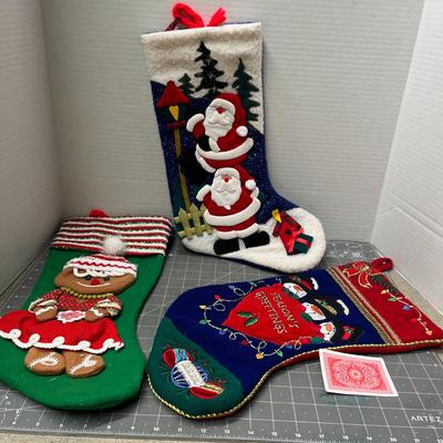 Sale Photo Thumbnail #661: 3 Christmas stockings—gingerbread, Santas, Santa scene.