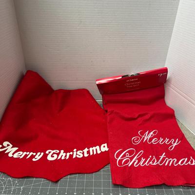 Sale Photo Thumbnail #694: 2 red felt skirts, sturdy green metal stand, festive design.