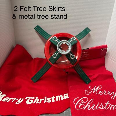 Sale Photo Thumbnail #693: 2 red felt skirts, sturdy green metal stand, festive design.