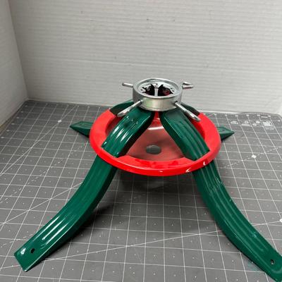 Sale Photo Thumbnail #695: 2 red felt skirts, sturdy green metal stand, festive design.