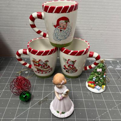 Sale Photo Thumbnail #710: 3 mugs, ornaments, candle, ribbon, tree, poinsettia flowers.