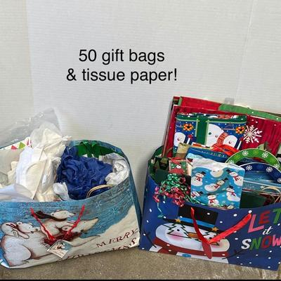 Sale Photo Thumbnail #728: 50 assorted bags, colorful tissue, festive holiday designs.
