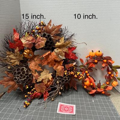 Sale Photo Thumbnail #738: 15 inch wreath, 10 inch wreath, leaves, berries, pumpkins.