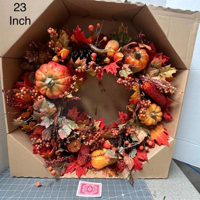 Sale Photo Thumbnail #748: 23 inch wreath, pumpkins, pinecones, berries, colorful autumn leaves.