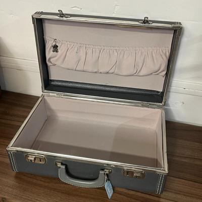 Sale Photo Thumbnail #824: Includes two cases, leather accents, metal clasps, matching size.