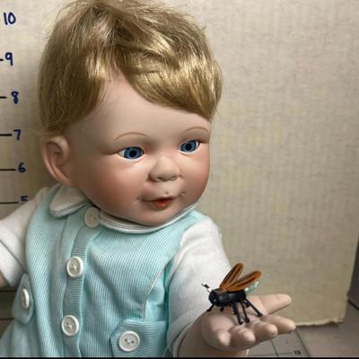 Sale Photo Thumbnail #927: 11 inch. Includes toy plane, shoes, box, certificates, lifelike baby doll.