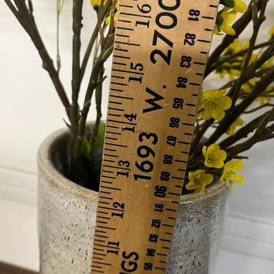 Sale Photo Thumbnail #967: Tall white vase, spring florals, yellow blossoms, green leaves, indoor decor.