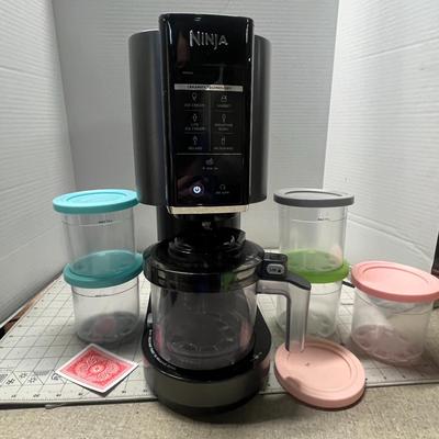 Sale Photo Thumbnail #18: Makes ice cream, sorbet, smoothies, drinks, includes 3 pints.