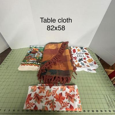 Sale Photo Thumbnail #1027: Includes 2 tablecloths Size - 82x58, 3 towels, 3 fall figurines, assorted colors.