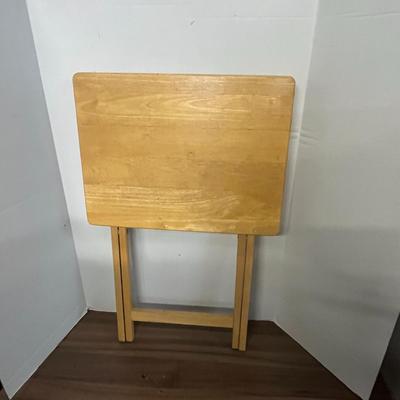 Sale Photo Thumbnail #1035: Portable rectangular table with support bar, light wood finish, compact.