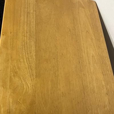 Sale Photo Thumbnail #1034: Portable rectangular table with support bar, light wood finish, compact.