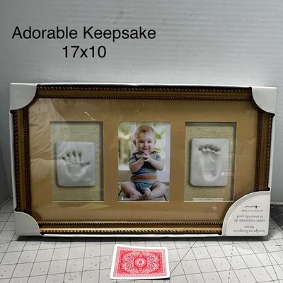 Sale Photo Thumbnail #1067: 17×10 inch frame with baby photo, handprint, footprint molds.