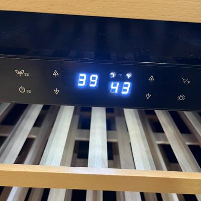 Sale Photo Thumbnail #10: Holds bottles, glass door, wood shelves