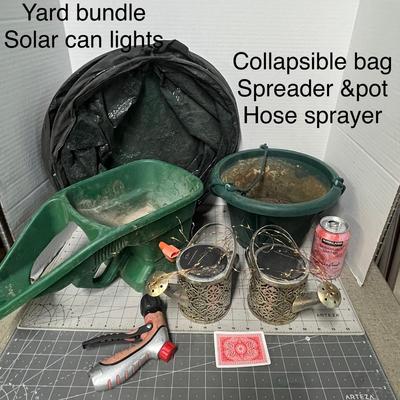 Sale Photo Thumbnail #1087: Includes 2 solar lights, sprayer, spreader, pot, collapsible bag.