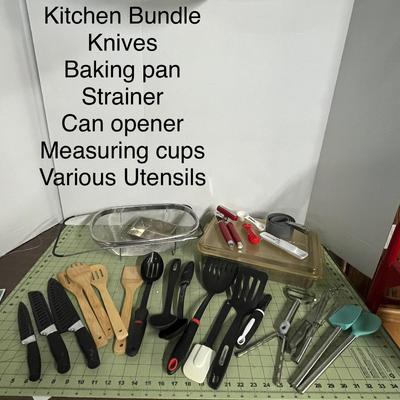Sale Photo Thumbnail #1090: Includes knives, baking pan, strainer, opener, measuring cups, and Various utensils.