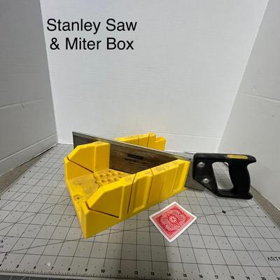 Sale Photo Thumbnail #1134: Includes saw and miter box; yellow plastic, black handle