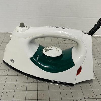 Sale Photo Thumbnail #1145: Electric iron with steam holes, green handle, black soleplate, corded.