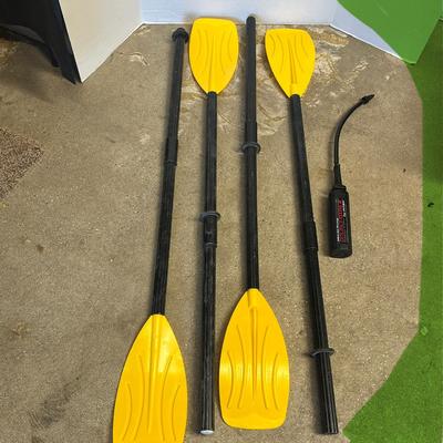 Sale Photo Thumbnail #1196: 2-person rafts, 4 paddles, hand pump.