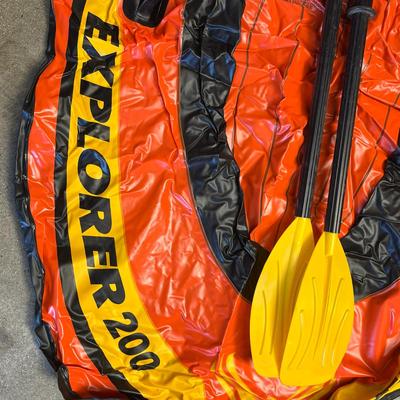 Sale Photo Thumbnail #1193: 2-person rafts, 4 paddles, hand pump.