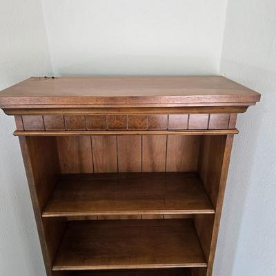 Vintage Chinoiserie library bookcase cabinet with upper shelves and a lower cabinet.