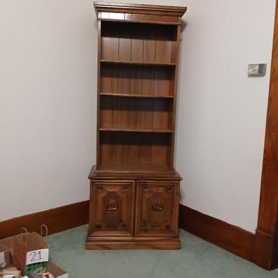 Vintage Chinoiserie library bookcase cabinet with upper shelves and a lower cabinet.