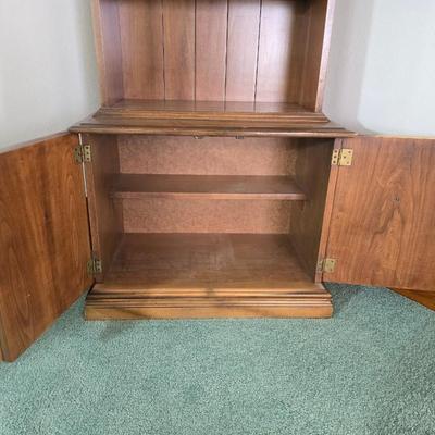 Vintage Chinoiserie library bookcase cabinet with upper shelves and a lower cabinet.