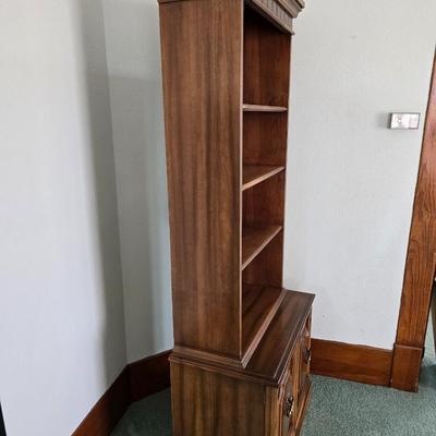 Vintage Chinoiserie library bookcase cabinet with upper shelves and a lower cabinet.
