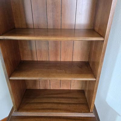 Vintage Chinoiserie library bookcase cabinet with upper shelves and a lower cabinet.