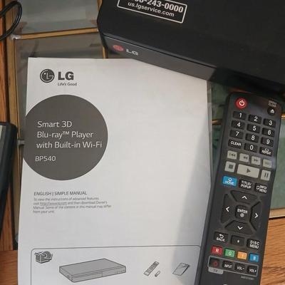 Boston Acustics TVee 26 soundbar with remote and an LG 3D Blueray disc DVD Player with remote and three DVD movies