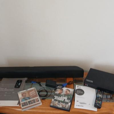Boston Acustics TVee 26 soundbar with remote and an LG 3D Blueray disc DVD Player with remote and three DVD movies