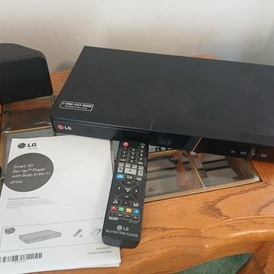 Boston Acustics TVee 26 soundbar with remote and an LG 3D Blueray disc DVD Player with remote and three DVD movies