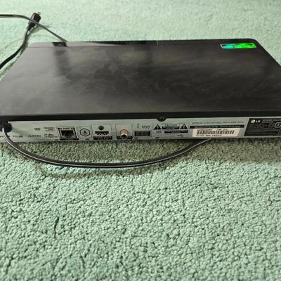 Boston Acustics TVee 26 soundbar with remote and an LG 3D Blueray disc DVD Player with remote and three DVD movies