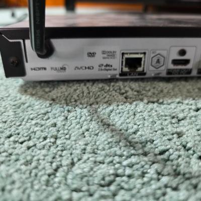 Boston Acustics TVee 26 soundbar with remote and an LG 3D Blueray disc DVD Player with remote and three DVD movies