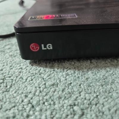 Boston Acustics TVee 26 soundbar with remote and an LG 3D Blueray disc DVD Player with remote and three DVD movies