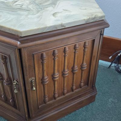 MCM hexagonal wood end table with a marble top and internal storage.