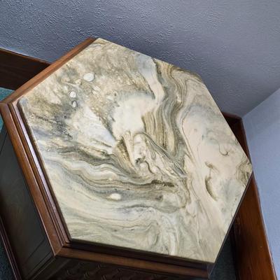 MCM hexagonal wood end table with a marble top and internal storage.