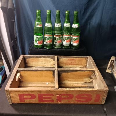 SECTIONED WOODEN PEPSI CRATE AND 5 GLASS MOUNTAIN DEW BOTTLES