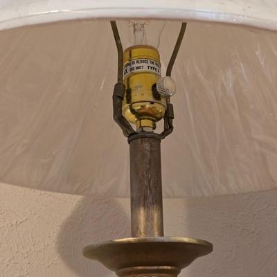 28" traditional-style brass table lamp with an ornate base and a white pleated shade