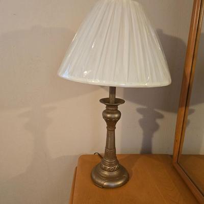 28" traditional-style brass table lamp with an ornate base and a white pleated shade