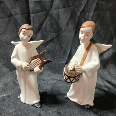 Rex Valencia porcelain boy angels playing musical instruments, handcrafted in Spain