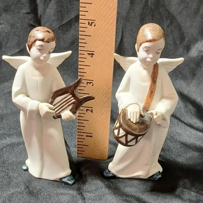 Rex Valencia porcelain boy angels playing musical instruments, handcrafted in Spain