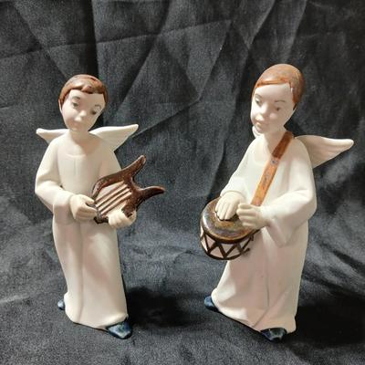 Rex Valencia porcelain boy angels playing musical instruments, handcrafted in Spain