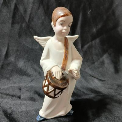 Rex Valencia porcelain boy angels playing musical instruments, handcrafted in Spain