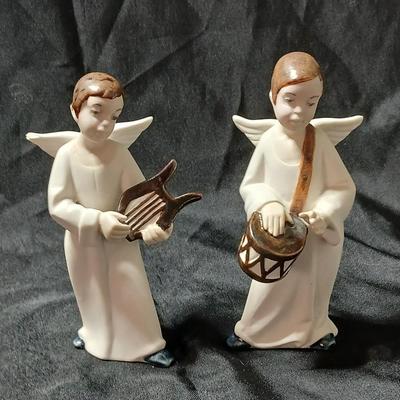 Rex Valencia porcelain boy angels playing musical instruments, handcrafted in Spain