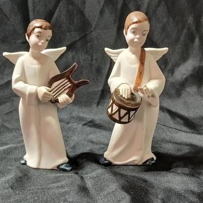 Rex Valencia porcelain boy angels playing musical instruments, handcrafted in Spain