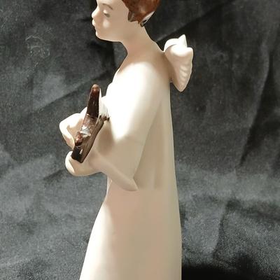 Rex Valencia porcelain boy angels playing musical instruments, handcrafted in Spain