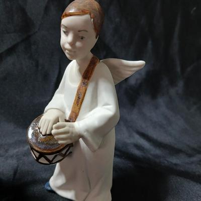 Rex Valencia porcelain boy angels playing musical instruments, handcrafted in Spain