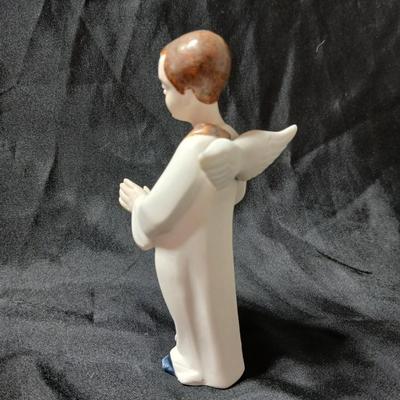 Rex Valencia porcelain boy angels playing musical instruments, handcrafted in Spain