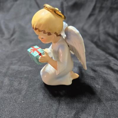 Vintage Schmid Brothers Christmas angel figurine and a ceramic December angel bell.